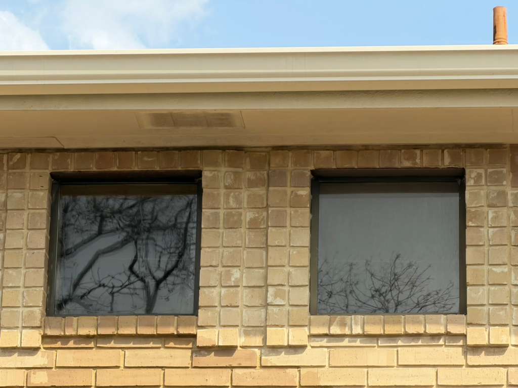 Brick building exterior window cleaning